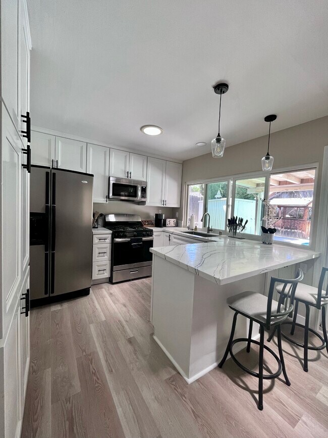 Photo - 10124-10123 3 Oaks Way