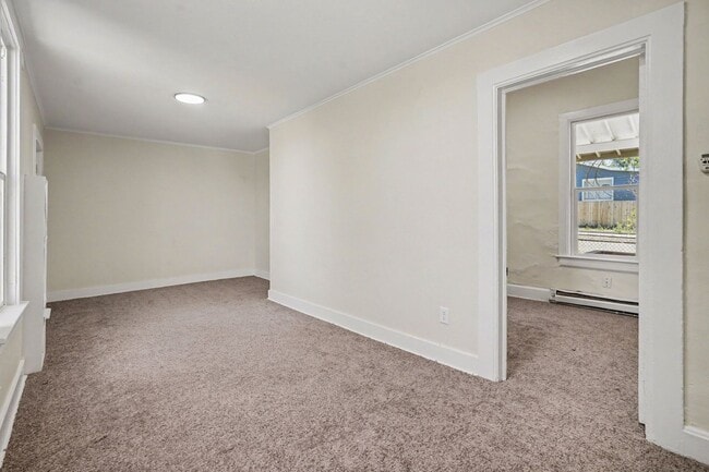 Photo - Charming 2 Bed / 1 Bath Duplex with Private Yard & Off-Street Parking