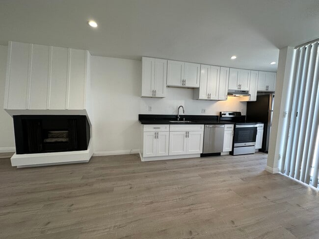 Kitchen + Fireplace - Croft Apartments