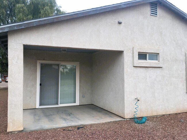 Photo - 3-Bedroom Single Family Home with Central Cooling, Attached Garage, and Tile Flooring