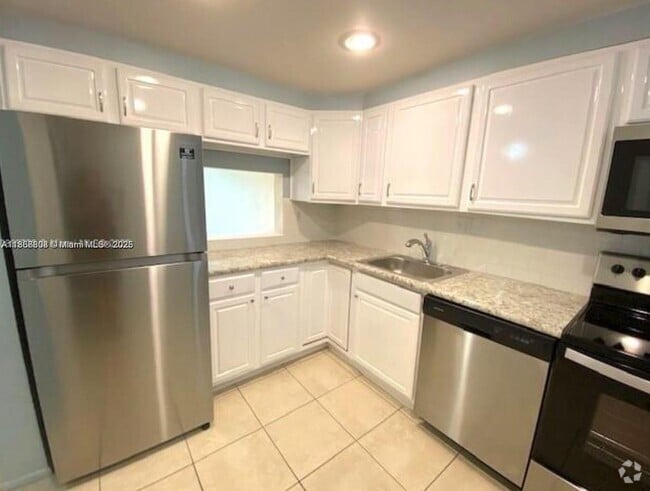 Building Photo - 7831 N Colony Cir Unit 108 Rental