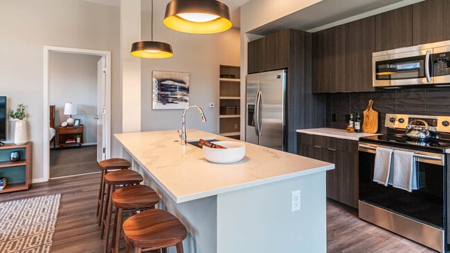 Kitchen with Stainless Steel Appliances and Breakfast Bar