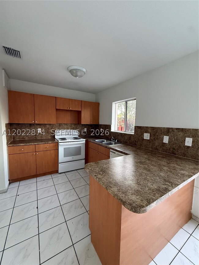 18615 NW 84th Pl.