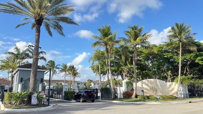 Building Photo - 9640 NW 2nd St Unit 5-204