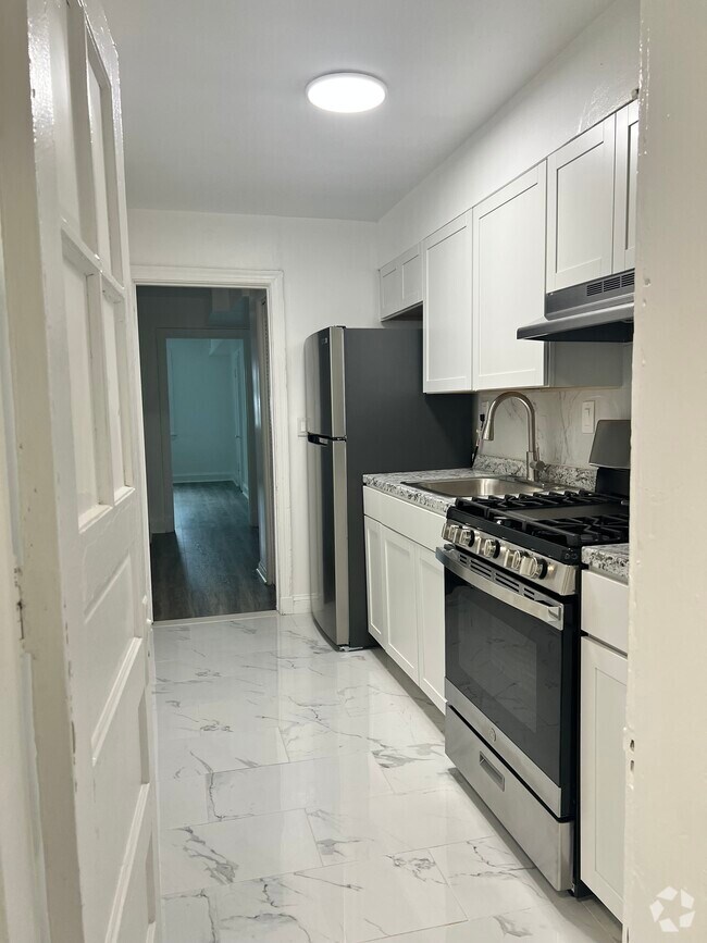 Building Photo - 4937 1st St NW Unit Morgan Manor Rental