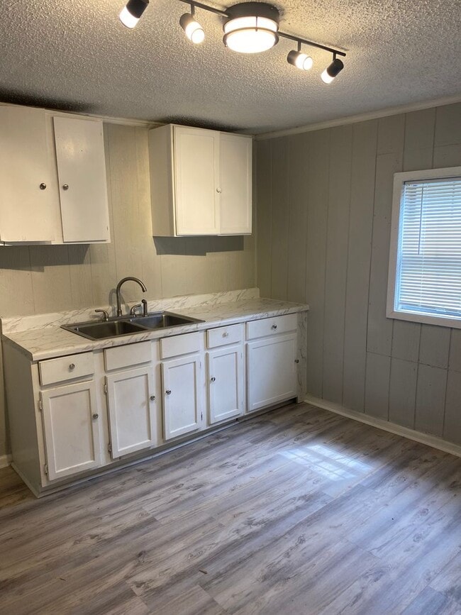 Photo - 2 Bedroom Home  with Fenced In Backyard 199.00 first month's rent