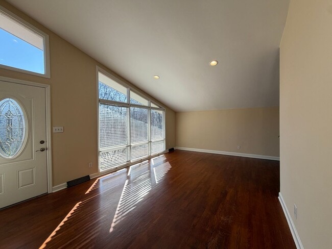 Photo - Freshly Painted Split-Level Home with Large Deck & Lawn Care Included