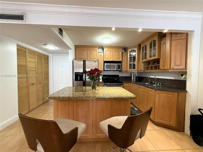 Building Photo - 9301 SW 92nd Ave Unit A213