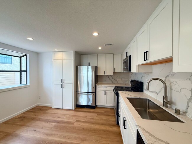 Photo - Experience refined coastal living in the h...