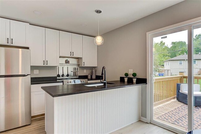 Photo - 9923 W 52nd St Townhome