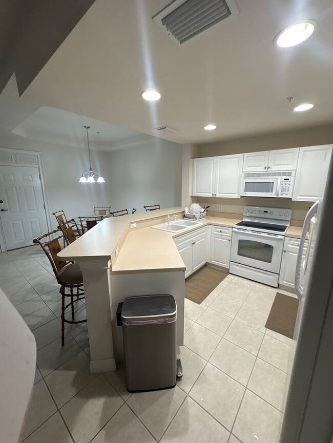 Photo - Lakeview Elegance in Porto Vista — 2 Bed / 2 Bath Condo with Private Garage