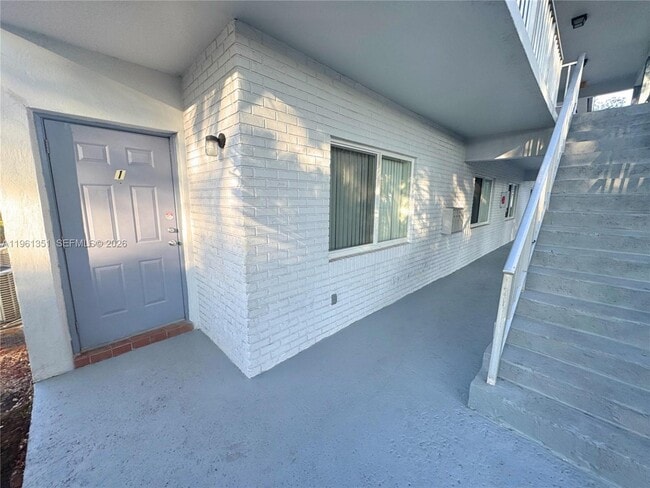 Building Photo - 10601 NW 45th St Unit 1