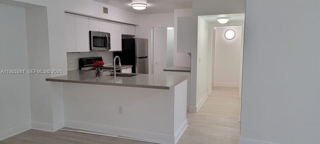 Building Photo - 12124 St.Andrews Pl Unit 201