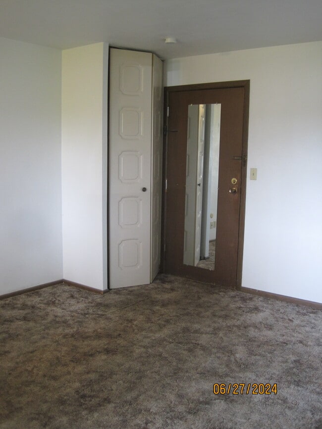 Small Coset and apartment door - Key Randall Apartments