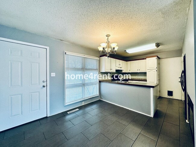 Photo - Charming Ranch Style, Prairie Village Home w/ a Fenced Yard, Updated Baths, and All Appliances In...