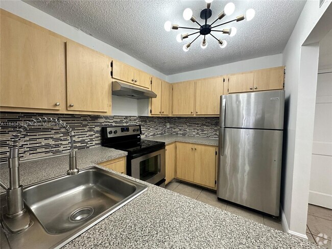 Building Photo - 13685 NE 10th Ave Unit 203 Rental