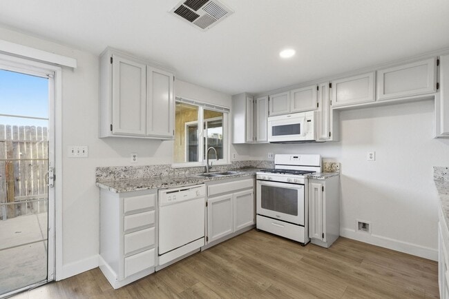 Photo - 3-Bedroom Home with Detached 2-Car Garage, Fireplace & Private Patio