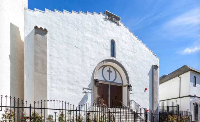 Front of remodeled and converted church - 900 N Hoover Apartments