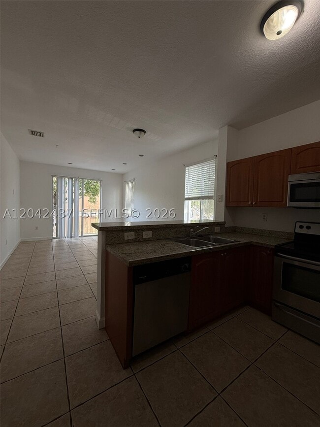 Photo - 17640 NW 73rd Ave Unit 200-19
