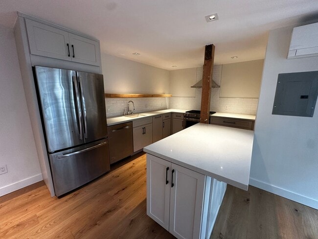 Photo - Fully Remodeled 1 Bedroom 1.5 Bath Garden Cottage with in unit Laundry