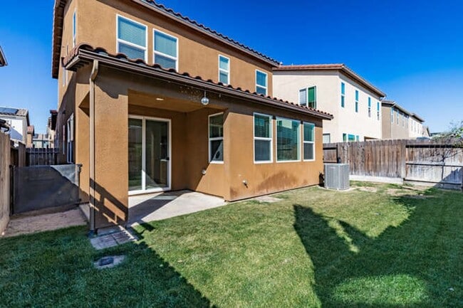 Photo - Charming Riverstone Home with Spacious Kitchen Island & Private Backyard