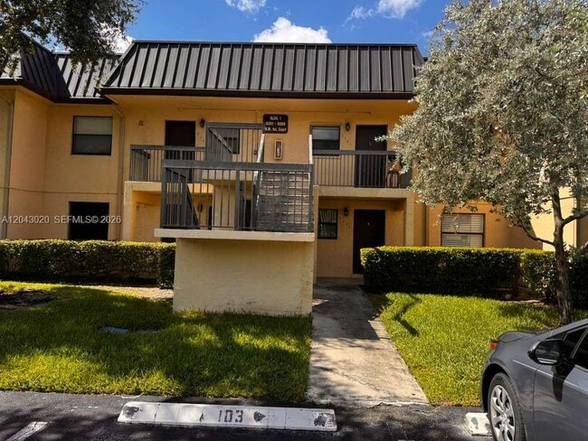 Building Photo - 9333 NW 1st Ct Unit 104