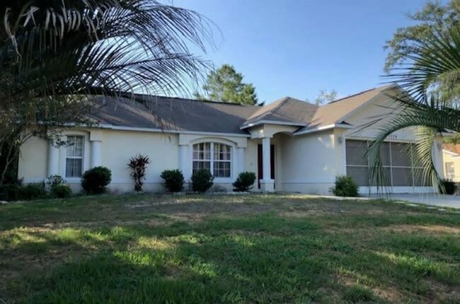 Building Photo - Spacious 3BR Home with Florida Room & Fenced Backyard