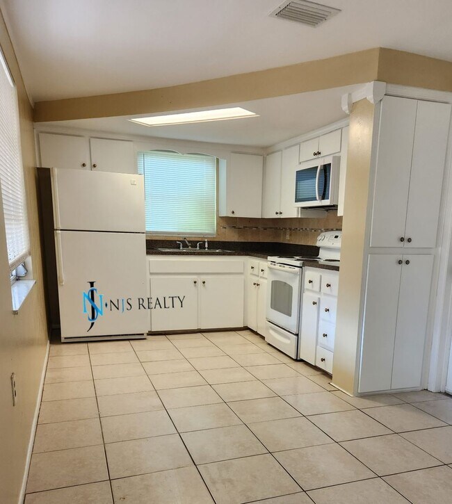Photo - Beautiful 2/2/1 1150 Sq. Ft. with BONUS ROOM!!... tile & luxury plank flooring, Frest paint and a...