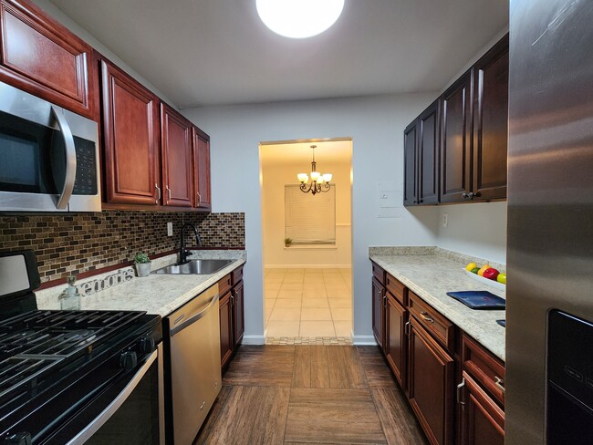 Photo - 3807 Saint Barnabas Rd Condo Unit 104