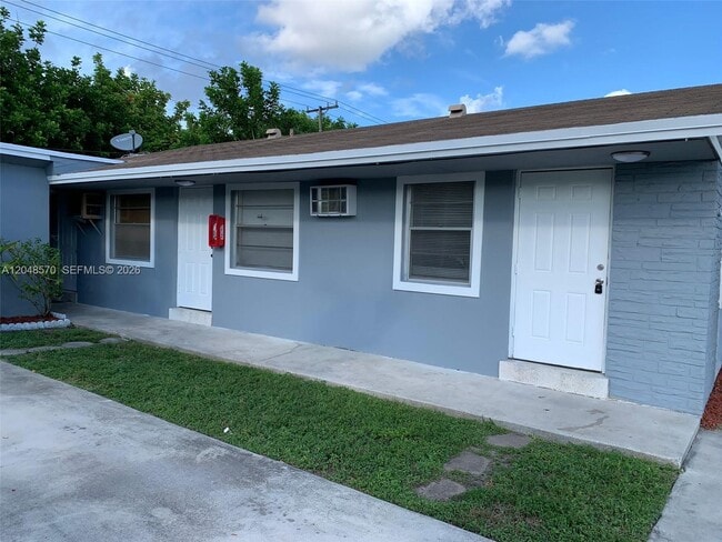 Building Photo - 6317 SW 18th St Unit .