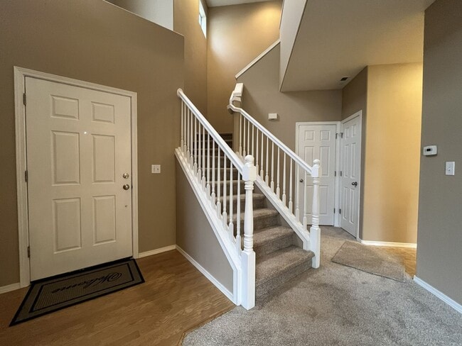 Photo - Inviting Two-Story 3BR Home Featuring Gas Range, Walk-In Closet, and Built-In Deck Seating