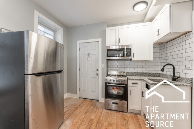 Building Photo - 1624 W Beach Ave Unit 1G