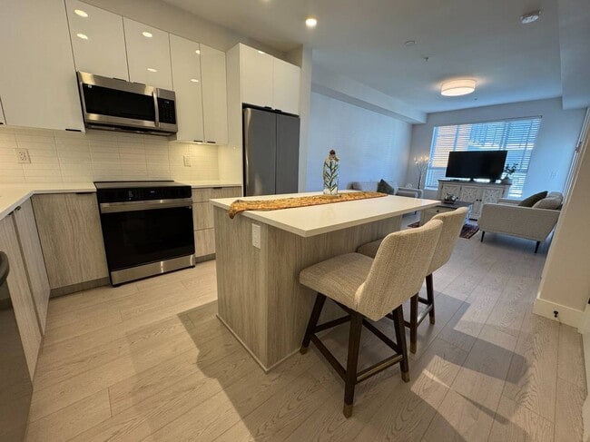 Building Photo - 11655 Fraser St Unit 402