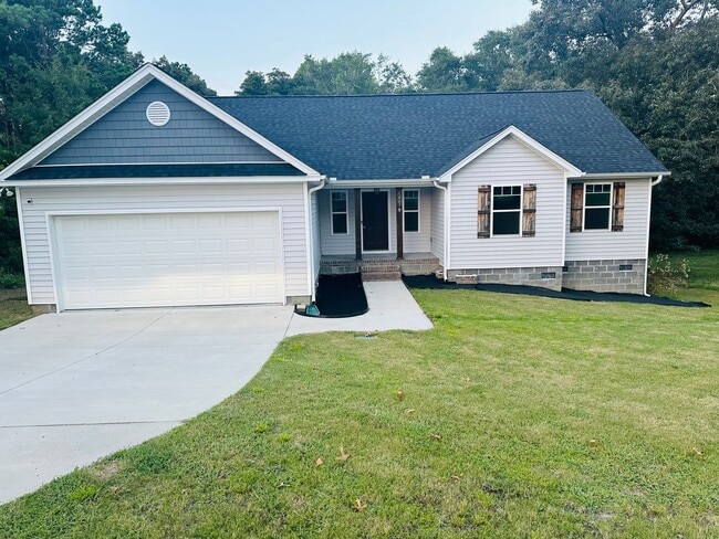 Building Photo - Spacious 4BR Home on 1.98 Acres with Modern Finishes in Tupelo Hills