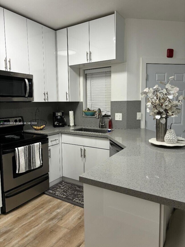 Photo - 18320 NW 68th Ave Unidad A