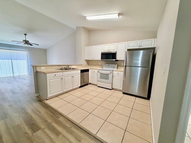 Photo - Charming 3BR/2BA Lehigh Acres Duplex with 1-Car Garage | Lawn Care & Salt Service Included