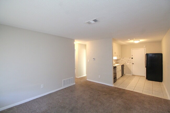 Photo - Updated 2BR/1BA Duplex Off 9 Mile Rd | All Tile Flooring | Pet-Friendly | Immediate Move-In Unit H1