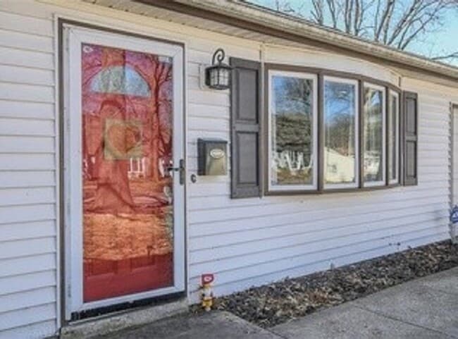 Photo - {5611} Updated OP Ranch + Two Car Garage + Fenced Yard and Stamped Concrete Patio Perfect for Spr...