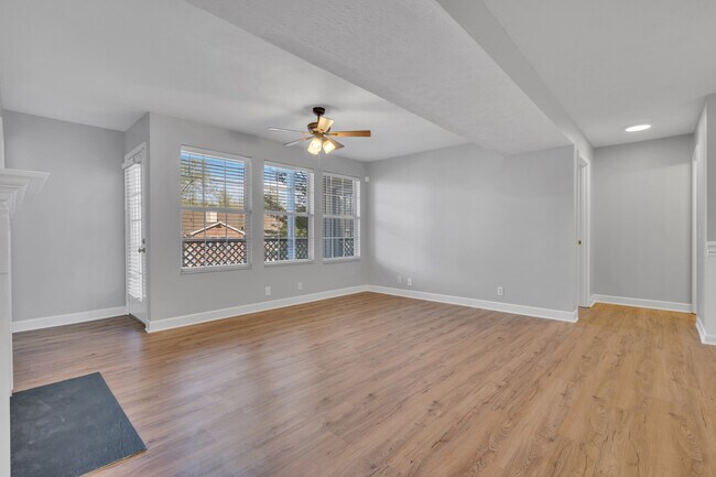 Living Room and Windows/Balcony - 151 N Timber Dr Unit 151 Timber Drive