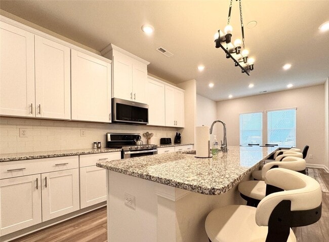 Photo - Enchanting 3-Story Single Home  | 4 BR/3.5BA | 2-Car Garage |In City Park Community!