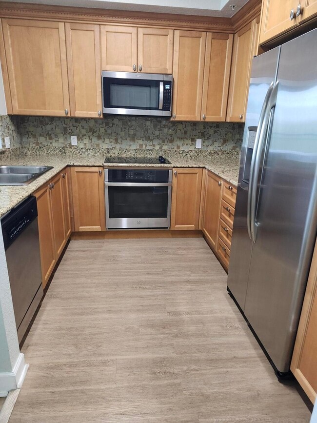 Building Photo - 1660 Renaissance Commons Blvd Unit 2504