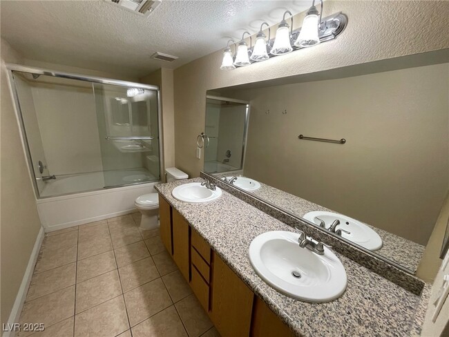 Building Photo - 5055 W Hacienda Ave Unit 2093