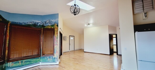 Dining Area and Living Room - 6290 Wolff St Townhome