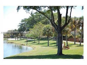 Building Photo - 14857 SW 104th St Unit 9-203