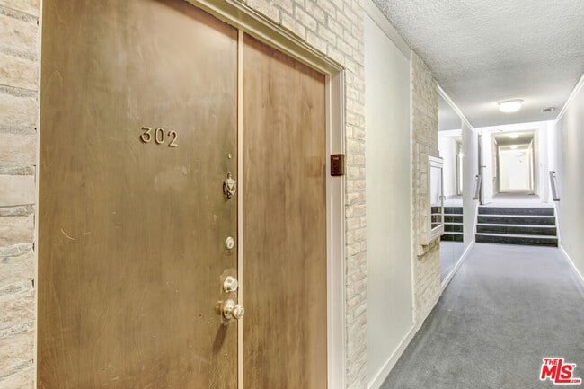 Photo - 831 S Gretna Green Way Unit 302