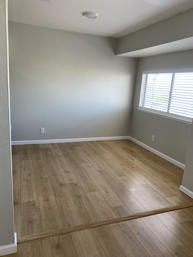 Photo - Updated Unit with Vinyl Floors & Stainless...