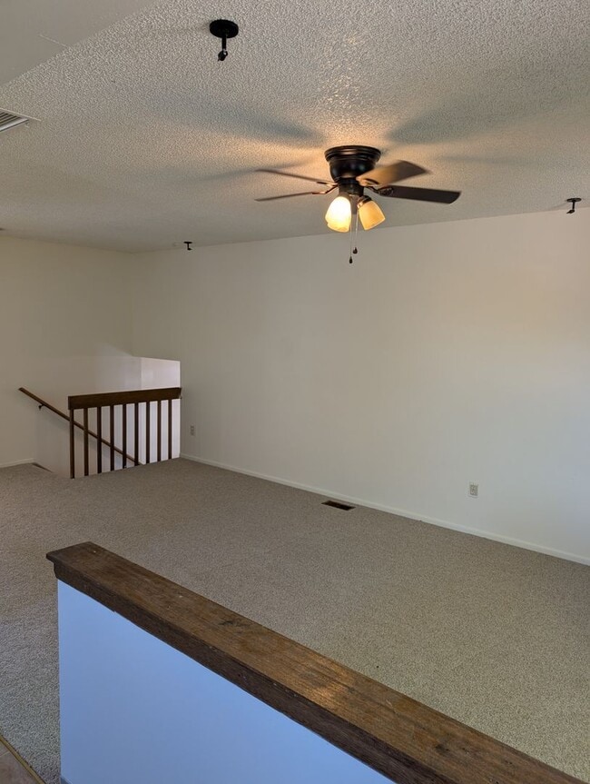 Photo - Widefield side entry bi-level home.