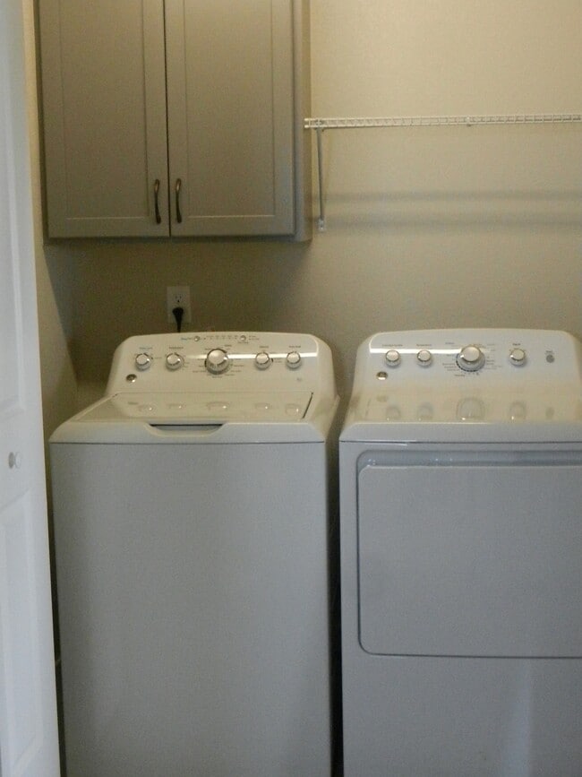 Upstairs Laundry. Washer and Dryer included. - 4846 Northern Lights Drive Unit A