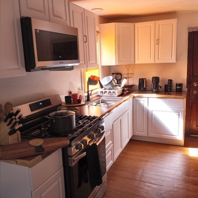 Building Photo - 25 Newcomb Pl Unit # 1