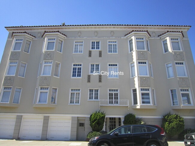 Building Photo - Marina: Renovated Corner Condo w/ Formal D... Unit 2